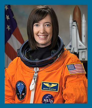 Photo portrait of K. Megan McArthur wearing NASA gear